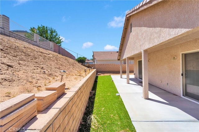 14303 Schooner Dr, Helendale, CA 92342 - fenced backyard featuring a patio area