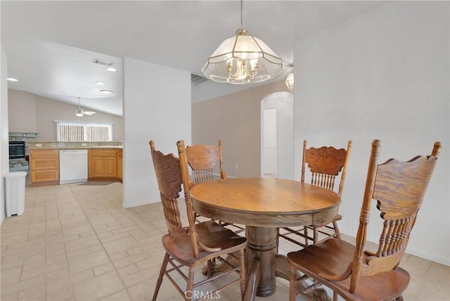 14303 Schooner Dr, Helendale, CA 92342 - dining room featuring arched walkways, a chandelier, and a ceiling fan