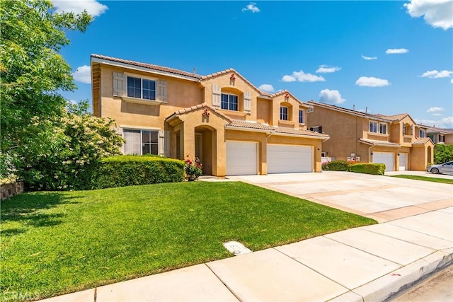 2207 Cork Oak St, Palmdale, CA 93551 - mediterranean / spanish-style home with stucco siding, an attached garage, a tile roof, driveway, and a front yard