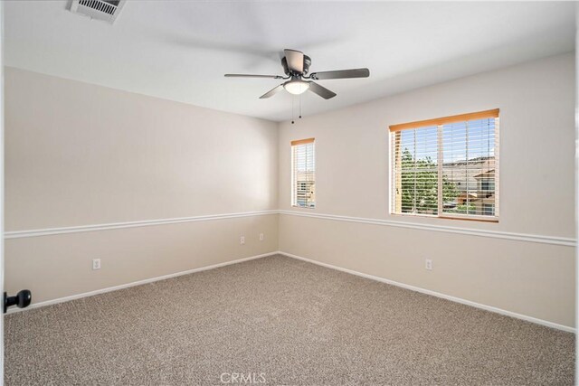 2207 Cork Oak St, Palmdale, CA 93551 - carpeted empty room with a ceiling fan and baseboards