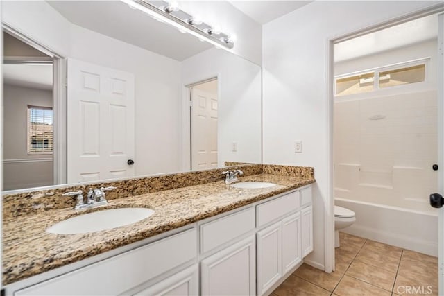 2207 Cork Oak St, Palmdale, CA 93551 - full bath with toilet, double vanity, tile patterned flooring, and shower / tub combination