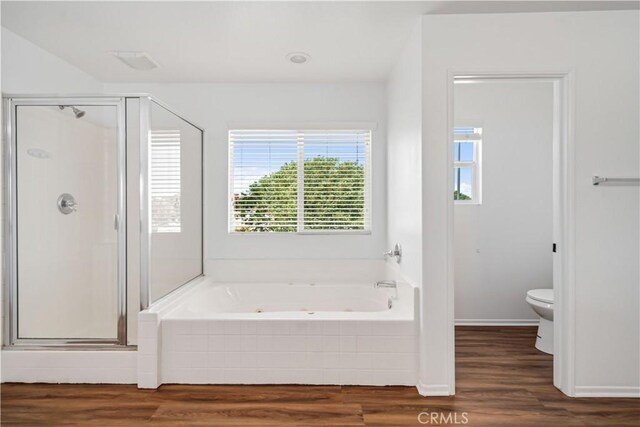 2207 Cork Oak St, Palmdale, CA 93551 - full bathroom featuring a stall shower, a whirlpool tub, toilet, and wood finished floors