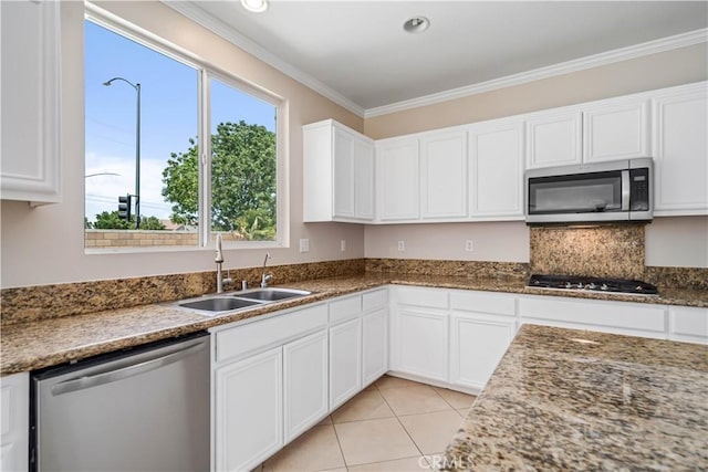 2207 Cork Oak St, Palmdale, CA 93551 - kitchen featuring stainless steel appliances, a sink, white cabinetry, and crown molding