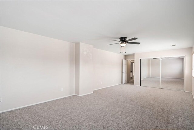 2207 Cork Oak St, Palmdale, CA 93551 - unfurnished bedroom featuring carpet flooring, baseboards, a ceiling fan, and a closet