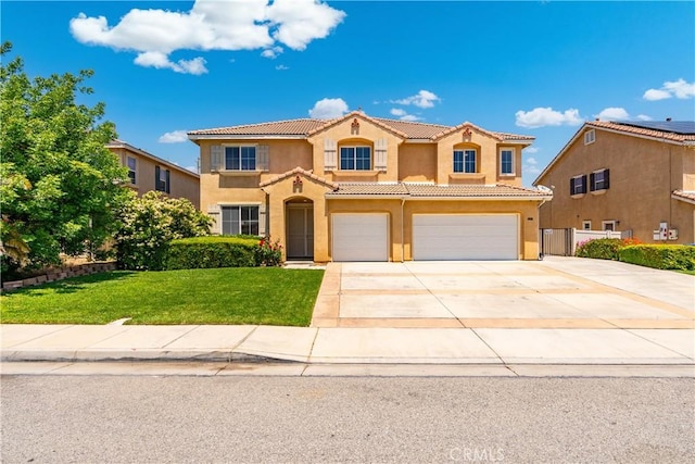 2207 Cork Oak St, Palmdale, CA 93551 - mediterranean / spanish-style house featuring a tiled roof, stucco siding, a garage, and concrete driveway