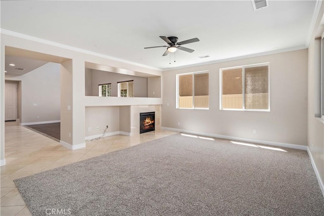2207 Cork Oak St, Palmdale, CA 93551 - unfurnished living room featuring tile patterned floors, a ceiling fan, a tiled fireplace, crown molding, and baseboards