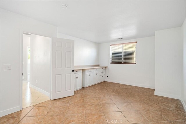 2207 Cork Oak St, Palmdale, CA 93551 - unfurnished room featuring light tile patterned floors, baseboards, and a smoke detector