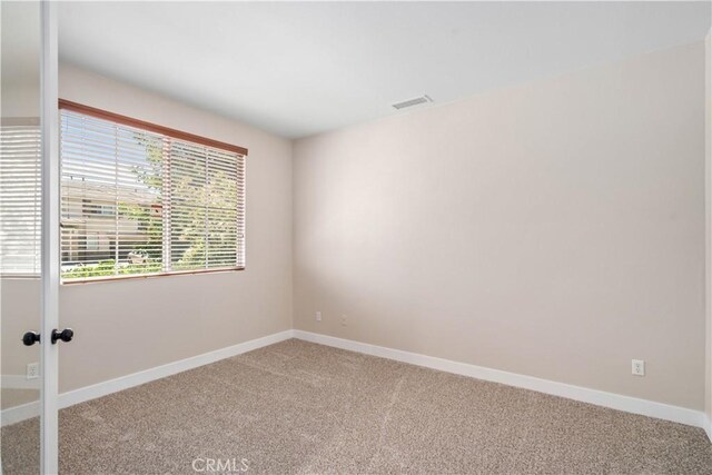 2207 Cork Oak St, Palmdale, CA 93551 - spare room featuring light colored carpet and baseboards