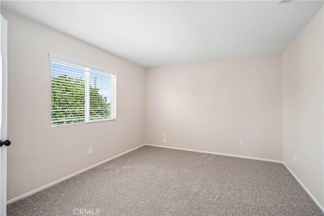 2207 Cork Oak St, Palmdale, CA 93551 - unfurnished room featuring carpet and baseboards