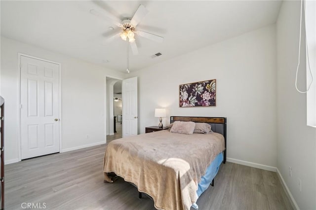 2583 Steeplechase Way, Norco, CA 92860 - bedroom with wood finished floors, baseboards, and arched walkways