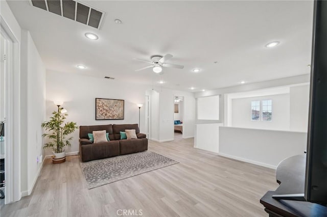 2583 Steeplechase Way, Norco, CA 92860 - living room featuring ceiling fan, light wood-style flooring, baseboards, and recessed lighting