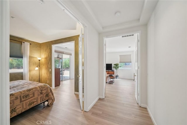2583 Steeplechase Way, Norco, CA 92860 - bedroom featuring multiple windows and light wood-style flooring