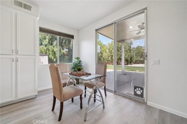 2583 Steeplechase Way, Norco, CA 92860 - dining area featuring light wood-type flooring, baseboards, and a ceiling fan