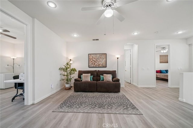 2583 Steeplechase Way, Norco, CA 92860 - bedroom featuring wood finished floors, arched walkways, recessed lighting, baseboards, and ceiling fan