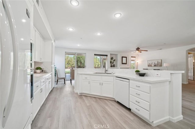 2583 Steeplechase Way, Norco, CA 92860 - kitchen featuring white appliances, a sink, light wood-type flooring, a ceiling fan, and white cabinetry