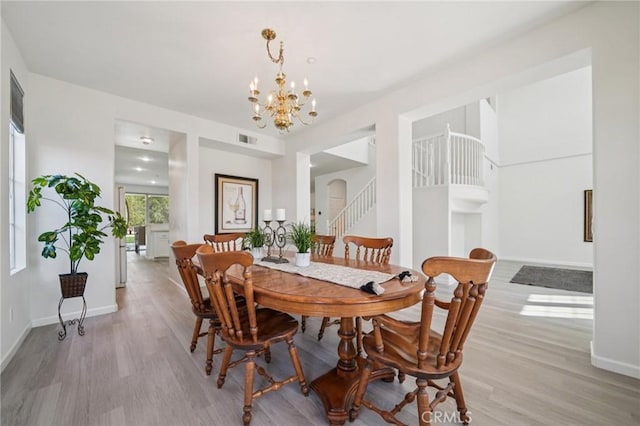 2583 Steeplechase Way, Norco, CA 92860 - dining space with a chandelier, light wood-type flooring, and baseboards