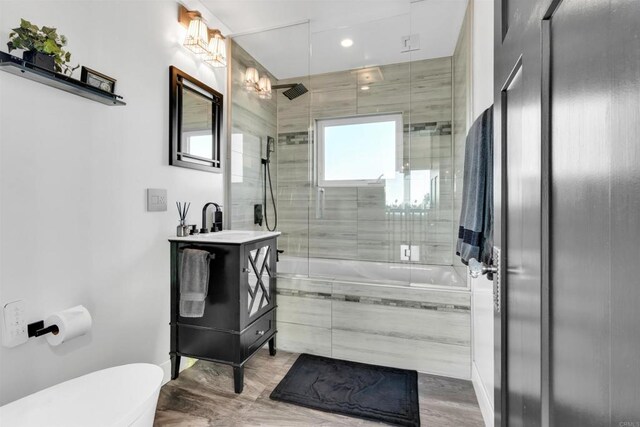 3388 Bancroft St, San Diego, CA 92104 - full bathroom featuring toilet, vanity, recessed lighting, and tiled shower / bath