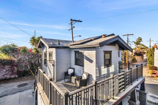 3388 Bancroft St, San Diego, CA 92104 - rear view of house featuring roof mounted solar panels