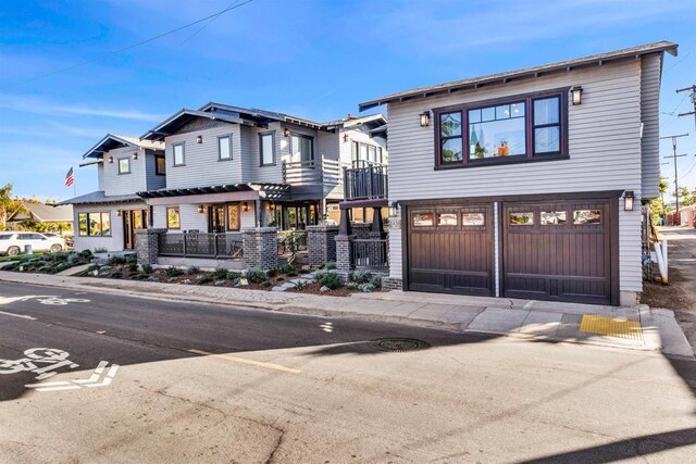3388 Bancroft St, San Diego, CA 92104 - view of front facade featuring an attached garage and a balcony