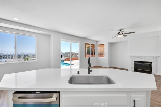29 Villa Valtelena, Lake Elsinore, CA 92532 - kitchen featuring a sink, dishwasher, open floor plan, light countertops, and recessed lighting