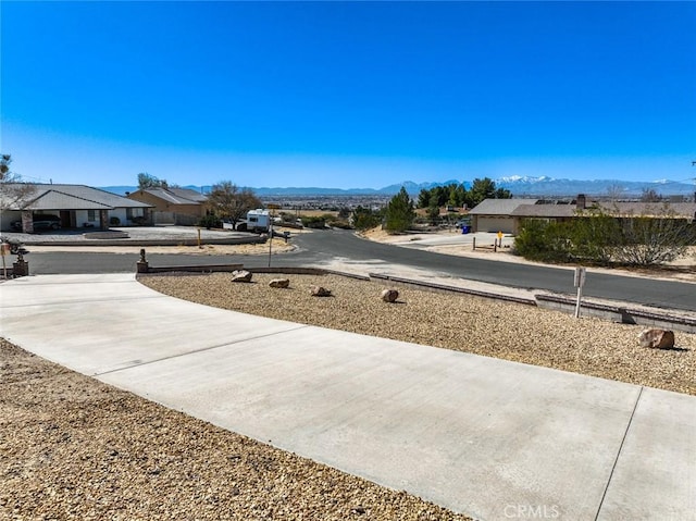 13889 Olathe Rd, Apple Valley, CA 92307 - view of yard featuring a mountain view