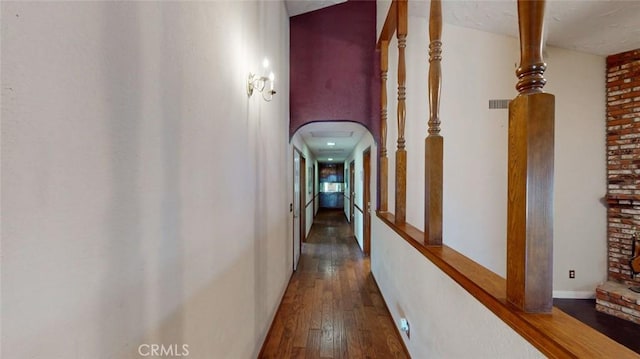13889 Olathe Rd, Apple Valley, CA 92307 - hall with wood-type flooring and arched walkways