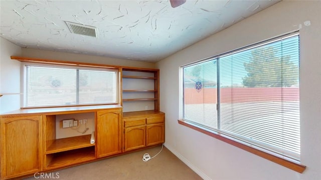 13889 Olathe Rd, Apple Valley, CA 92307 - unfurnished office featuring light carpet and baseboards