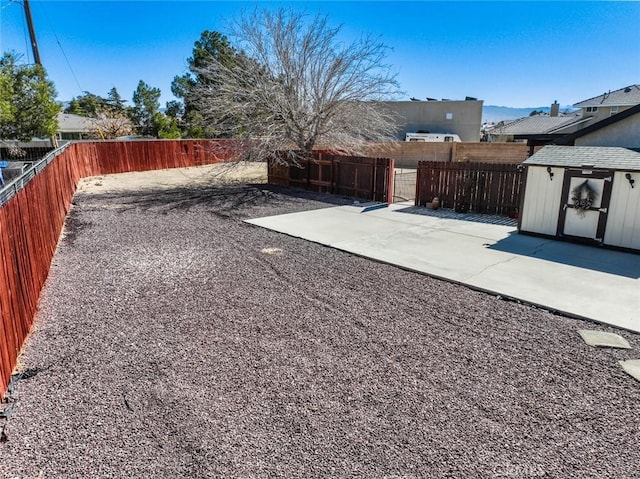 13889 Olathe Rd, Apple Valley, CA 92307 - fenced backyard with a patio