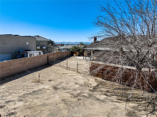 13889 Olathe Rd, Apple Valley, CA 92307 - fenced yard with a mountain view