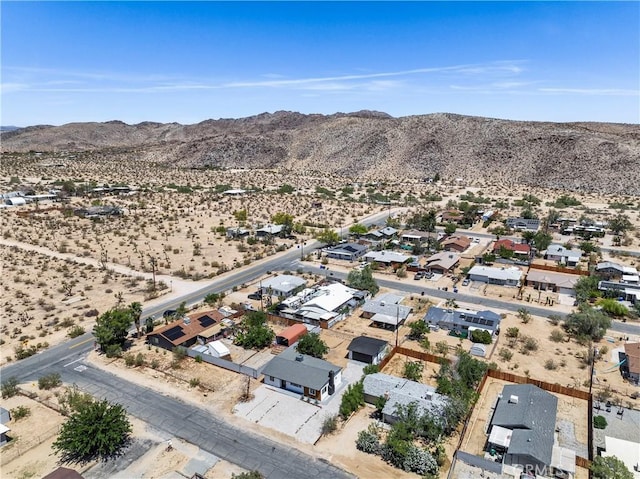 61730 Oleander Dr, Joshua Tree, CA 92252 - aerial perspective of suburban area featuring a desert landscape and a mountain backdrop