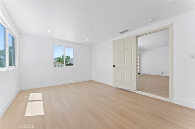61730 Oleander Dr, Joshua Tree, CA 92252 - spare room featuring light wood-style flooring, baseboards, and recessed lighting