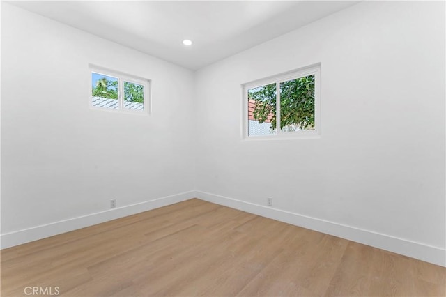 61730 Oleander Dr, Joshua Tree, CA 92252 - unfurnished room featuring baseboards, light wood-style flooring, and recessed lighting