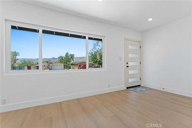 61730 Oleander Dr, Joshua Tree, CA 92252 - empty room featuring baseboards, wood finished floors, and recessed lighting