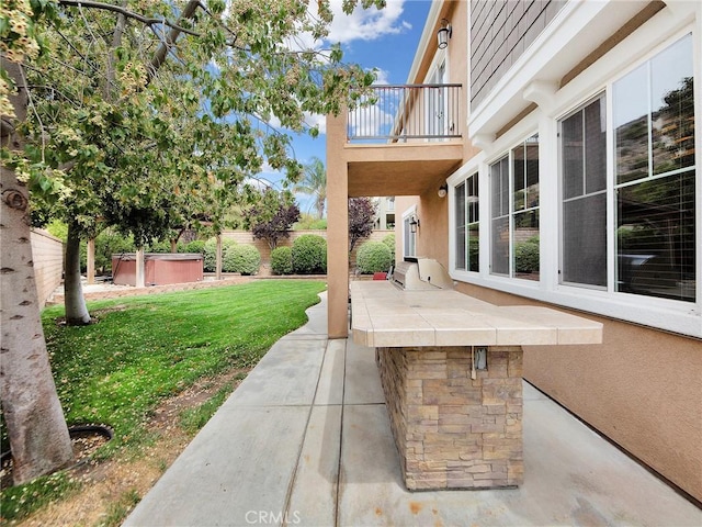 20361 Julia Ln, Saugus, CA 91350 - view of patio with a hot tub, a balcony, and area for grilling