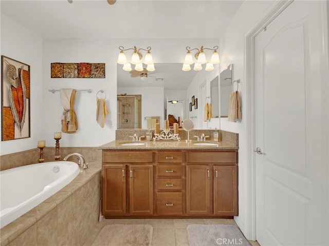 20361 Julia Ln, Saugus, CA 91350 - full bathroom featuring a stall shower, a bath, double vanity, tile patterned floors, and ceiling fan