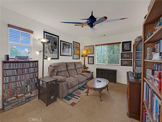 20361 Julia Ln, Saugus, CA 91350 - carpeted living area with ceiling fan and plenty of natural light