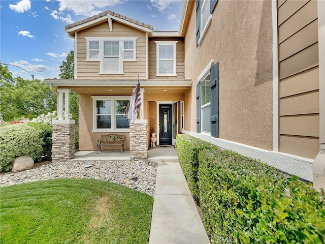 20361 Julia Ln, Saugus, CA 91350 - view of front of home featuring covered porch and stucco siding