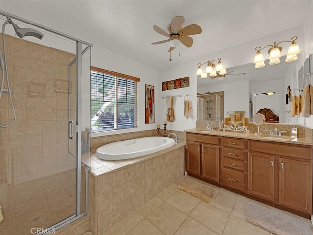 20361 Julia Ln, Saugus, CA 91350 - bathroom with a shower stall, a garden tub, double vanity, tile patterned flooring, and ceiling fan