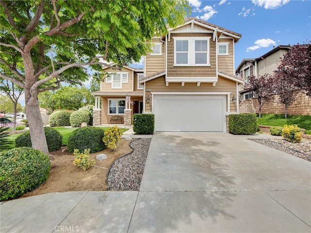 20361 Julia Ln, Saugus, CA 91350 - craftsman-style house featuring an attached garage, driveway, and stone siding