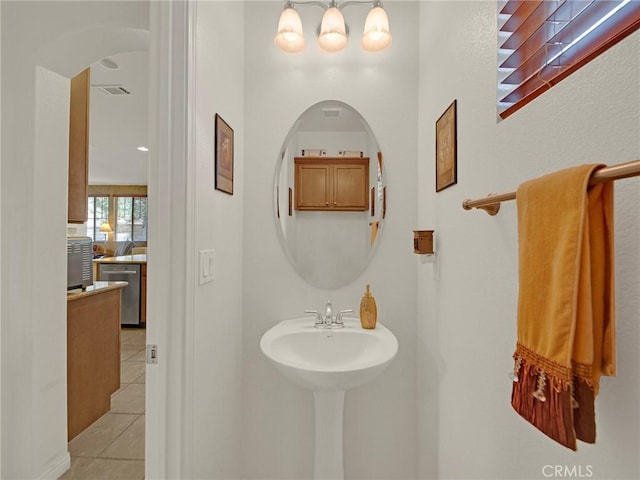 20361 Julia Ln, Saugus, CA 91350 - bathroom featuring tile patterned floors and a chandelier