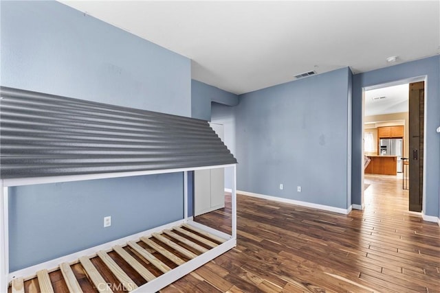 35616 Suzette Ct, Winchester, CA 92596 - empty room with wood finished floors, baseboards, and a smoke detector