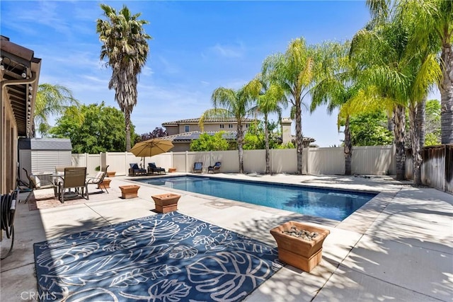 35616 Suzette Ct, Winchester, CA 92596 - view of pool featuring a fenced backyard, a patio, and outdoor dining area