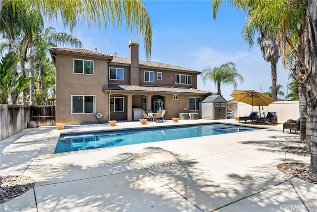35616 Suzette Ct, Winchester, CA 92596 - view of swimming pool featuring a fenced backyard, a patio, and central air condition unit