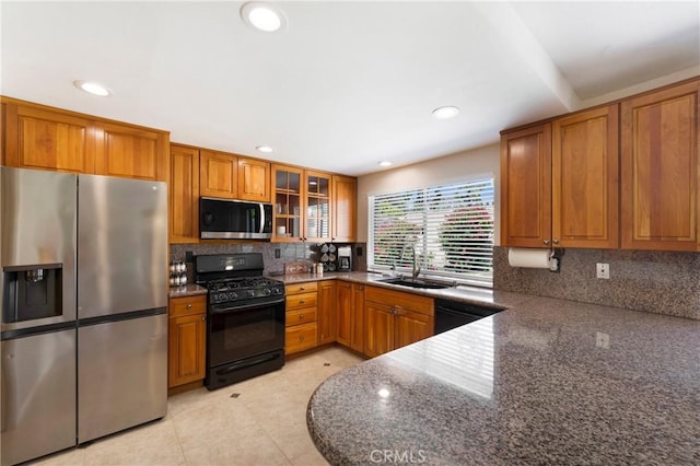 21848 Ute Way, Lake Forest, CA 92630 - kitchen featuring black appliances, a sink, brown cabinets, and recessed lighting