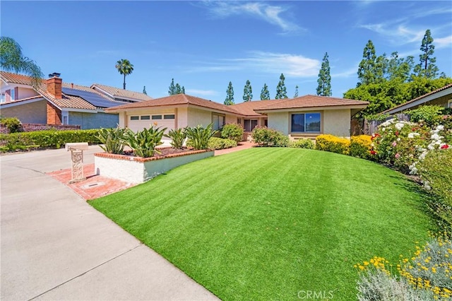 21848 Ute Way, Lake Forest, CA 92630 - ranch-style house with a garage, stucco siding, a front lawn, and driveway