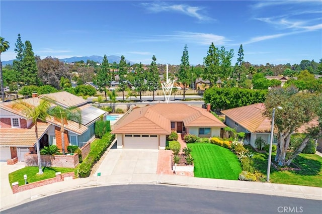 21848 Ute Way, Lake Forest, CA 92630 - view of front facade with concrete driveway, a residential view, a tile roof, a garage, and stucco siding