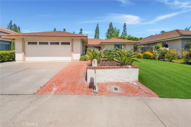 21848 Ute Way, Lake Forest, CA 92630 - ranch-style home featuring stucco siding, concrete driveway, a front lawn, and a garage