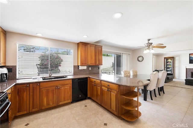 21848 Ute Way, Lake Forest, CA 92630 - kitchen with dishwasher, brown cabinets, tasteful backsplash, and recessed lighting