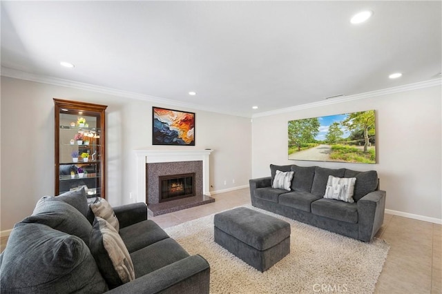 21848 Ute Way, Lake Forest, CA 92630 - living area featuring recessed lighting, a glass covered fireplace, crown molding, light tile patterned flooring, and baseboards