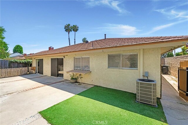 21848 Ute Way, Lake Forest, CA 92630 - view of front of house with cooling unit, a patio, and stucco siding
